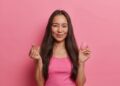 Girl holding menstrual cup