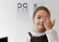 kid while closing left eye