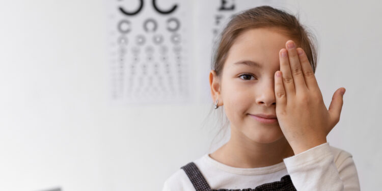 kid while closing left eye